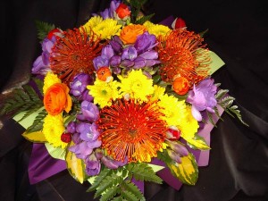 Seasonal flowers in a coloured box