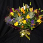 bouquet of flowers including lilies and roses