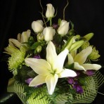 Mostly white flowers arranged in a box