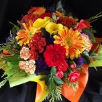 Posy of flowers in a coloured box