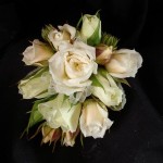corsage of white roses